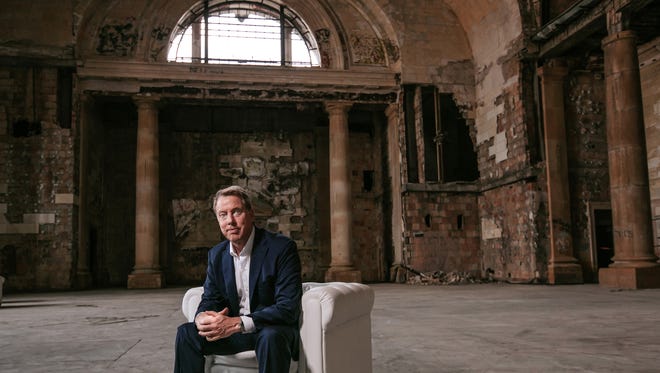 alt="Ford Motor Co. Executive Chairman Bill Ford Jr. poses for a photo in Michigan Central Station in Detroit's Corktown neighborhood in Detroit on Wednesday, June 13, 2018."